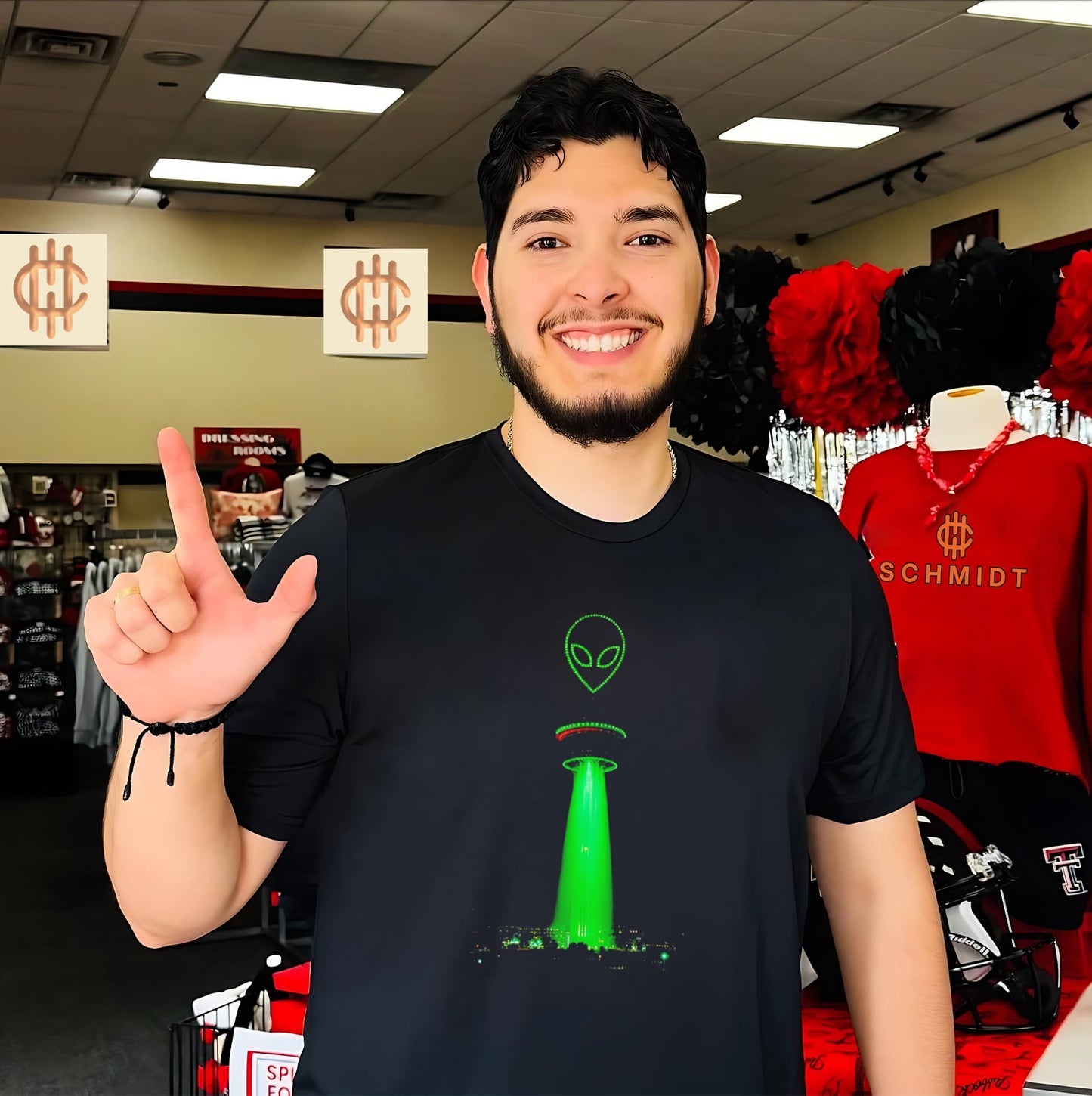 Alien UFO beaming down on city graphic shirt