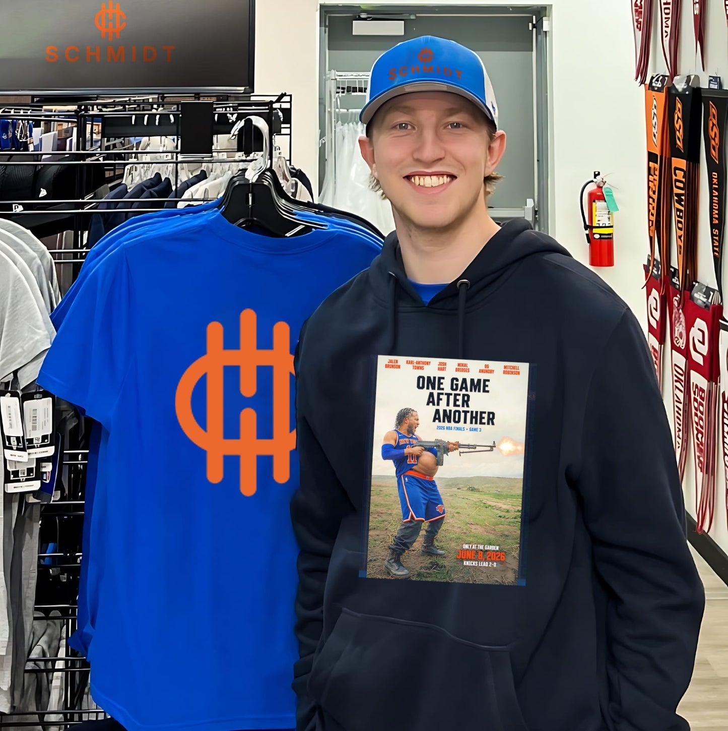 New York Knicks one game after another Jalen Brunson holding rifle shirt