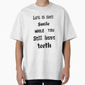 Life is shit smile while you still have teeth. by HenryClinton